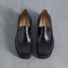 Mocassins Yukoner Penny en cuir noir pour homme Mocassins Yukoner Penny en cuir noir pour homme