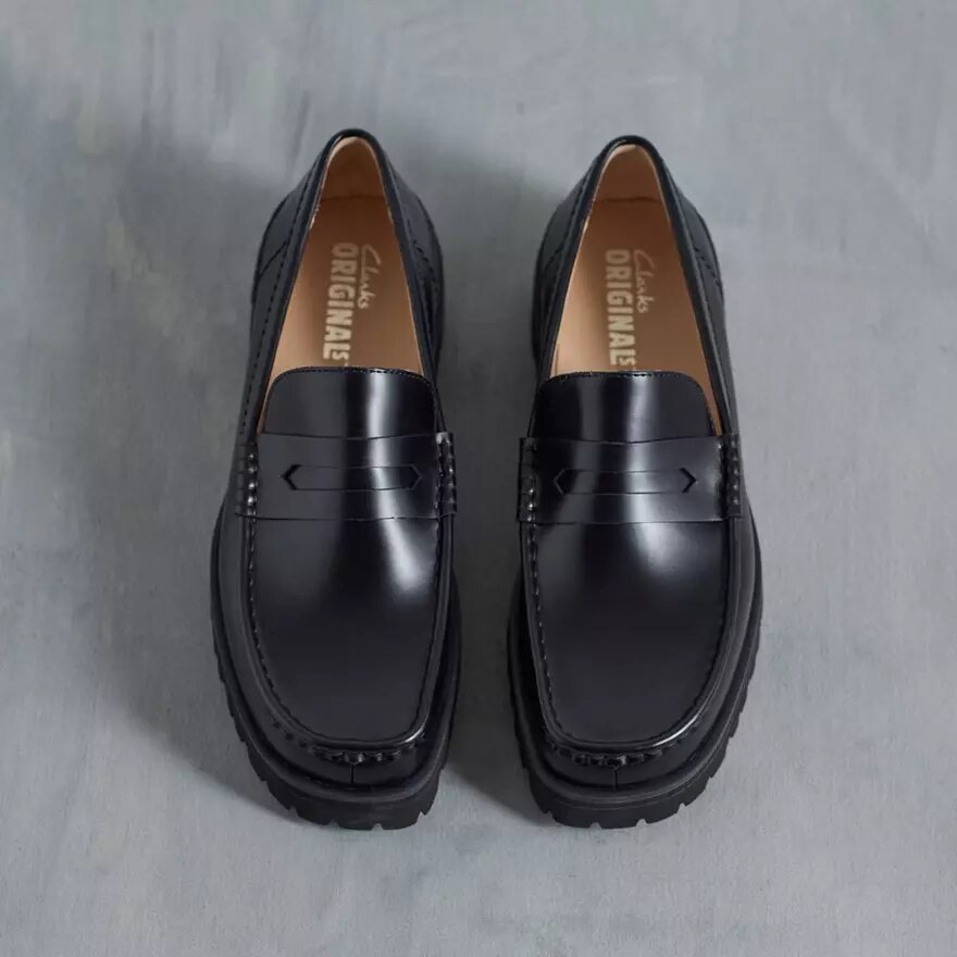 Mocassins Yukoner Penny en cuir noir pour homme Mocassins Yukoner Penny en cuir noir pour homme