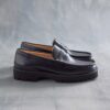 Mocassins Yukoner Penny en cuir noir pour homme Mocassins Yukoner Penny en cuir noir pour homme