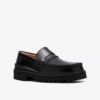 Mocassins Yukoner Penny en cuir noir pour homme Mocassins Yukoner Penny en cuir noir pour homme