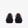 Mocassins Yukoner Penny en cuir noir pour homme Mocassins Yukoner Penny en cuir noir pour homme
