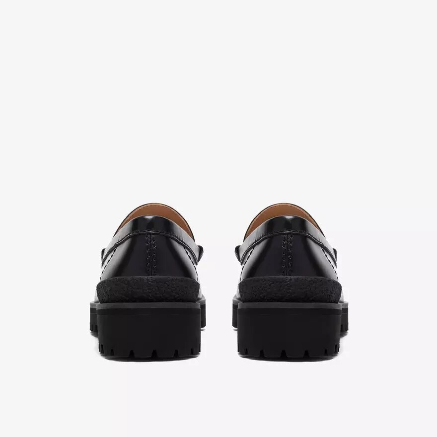 Mocassins Yukoner Penny en cuir noir pour homme Mocassins Yukoner Penny en cuir noir pour homme