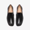 Mocassins Yukoner Penny en cuir noir pour homme Mocassins Yukoner Penny en cuir noir pour homme