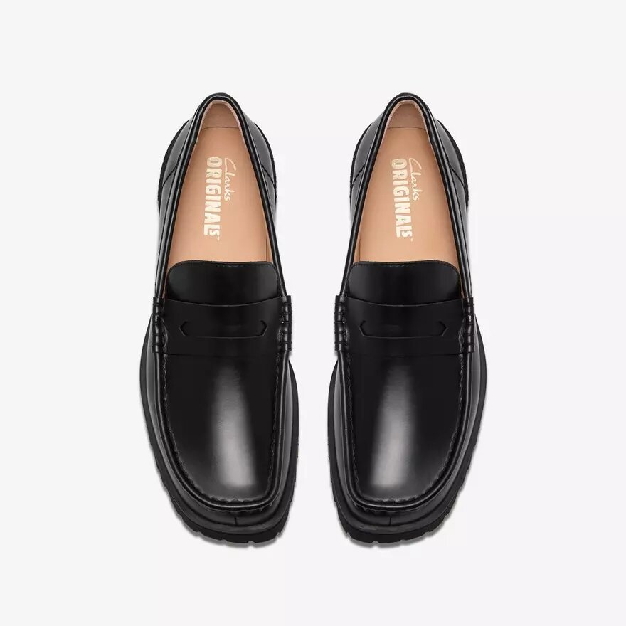 Mocassins Yukoner Penny en cuir noir pour homme Mocassins Yukoner Penny en cuir noir pour homme