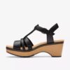 Sandales compensées Seannah Madi en cuir noir pour femme Sandales compensées Seannah Madi en cuir noir pour femme