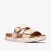 Sandales plates Arwell Step en cuir crème pour femme Sandales plates Arwell Step en cuir crème pour femme