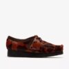 Wallabee pour femme. Wallabees marron à imprimé vache Wallabee pour femme. Wallabees marron à imprimé vache