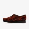 Wallabee pour femme. Wallabees marron à imprimé vache Wallabee pour femme. Wallabees marron à imprimé vache