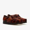 Wallabee pour femme. Wallabees marron à imprimé vache Wallabee pour femme. Wallabees marron à imprimé vache