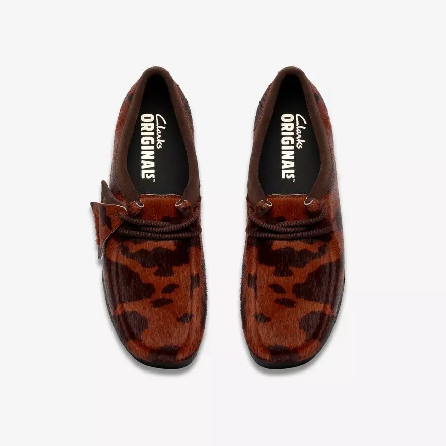 Wallabee pour femme. Wallabees marron à imprimé vache Wallabee pour femme. Wallabees marron à imprimé vache