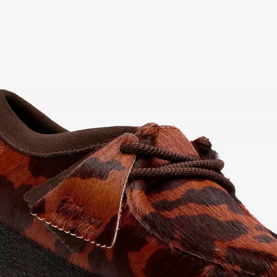Wallabee pour femme. Wallabees marron à imprimé vache Wallabee pour femme. Wallabees marron à imprimé vache